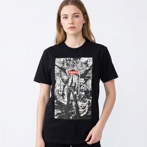 Supreme Crewneck Black Tee with Red Box Logo and Monochrome Graphic